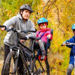 family-cycling-golden-autumn-park-active-father-kids-ride-bikes-family-sport-fitness-outdoors_146539-2364